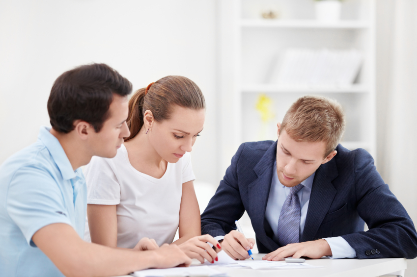 A financial advisor working with a young couple